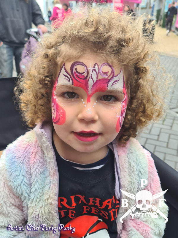 Pink unicorn face paint by Chers funky faces at Brixham pirate festival