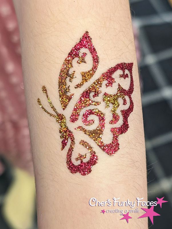 Glitter tattoo red and gold butter fly