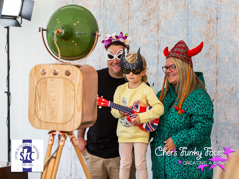 Family-getting-silly-photo-at-steve-hoskin-construction-family-fun-day