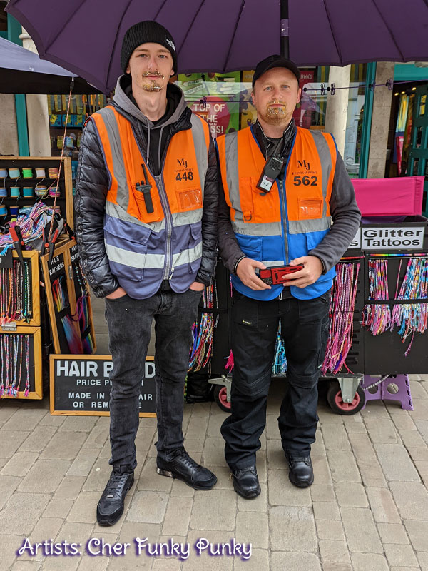 Security-getting-involved-at-Winchester-Hat-Fair-glitter-beards-Chers-funky-faces