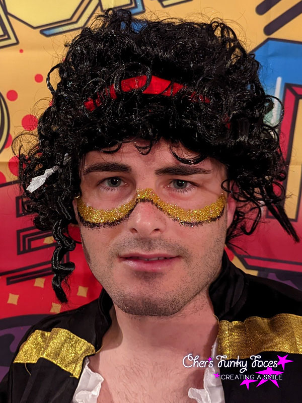 Adam-ant-style-glitter-across-nose-in-black-and-gold-by-chers-funky-faces