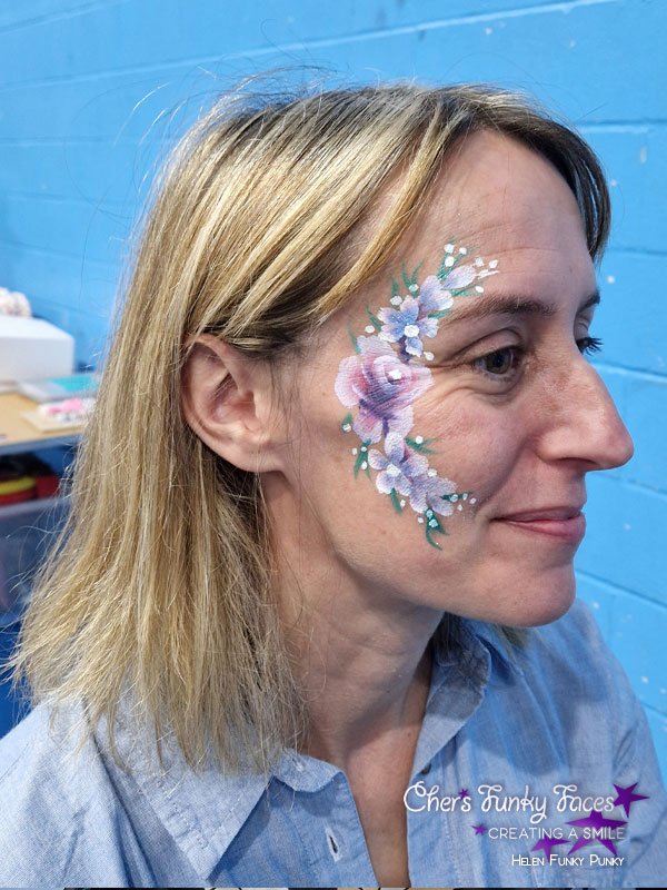 Rose and Flowers painted on cheek and around the eye by Helen Funky Punky Chers Funky Faces