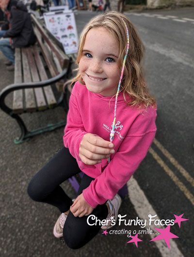 Pale-rainbow-braid-Padstow-face-paint.jpg