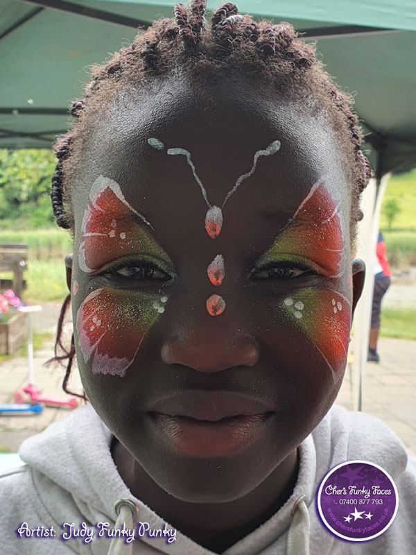 Neon-butterfly-by-Chers-Funky-Faces-for-Calstock-Outreach-Group-Refugee-Week.jpg