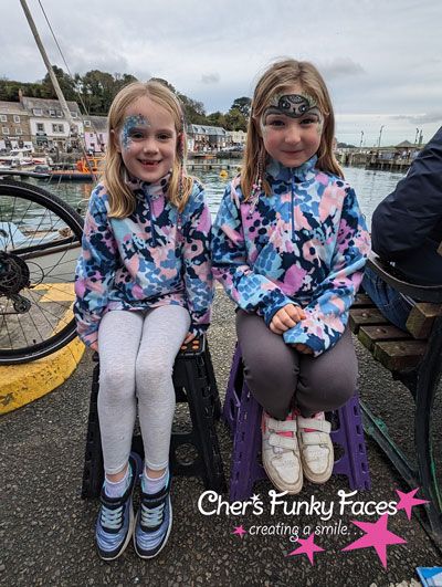 Sloth-and-flowers-Padstow-face-paint.jpg