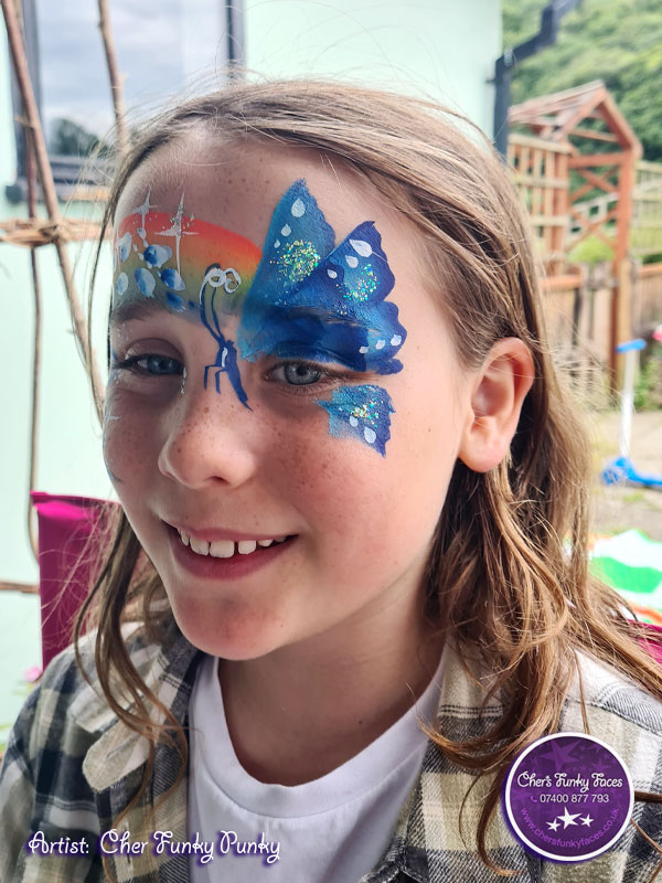 Butterfly-and-rainbow-flowers-by-Chers-Funky-Faces-for-Calstock-Outreach-Group-Refugee-Week.jpg