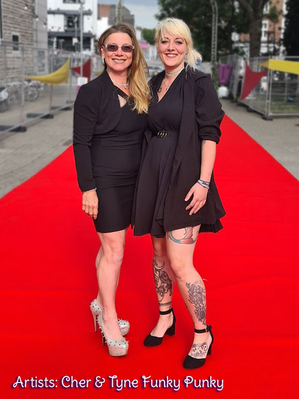 Cher and Tyne Funky Punky dressed in black dresses for the UPSU Summer Ball Glitter Bar