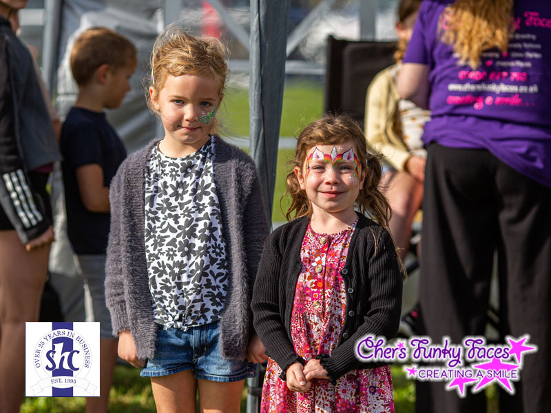 Dragon fly and unicorn face painted by sophia funky punky at steve hosking construction family fun day