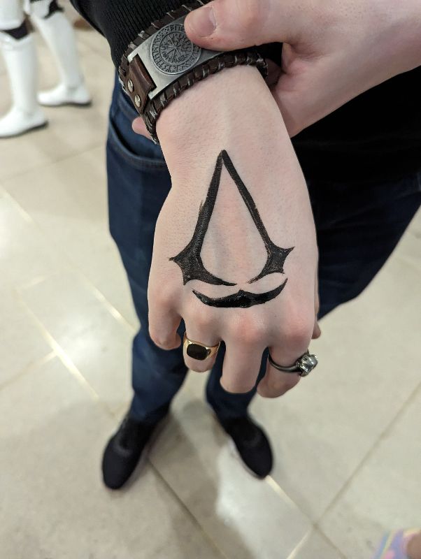 Devcon character logo