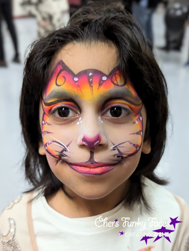 Sunset rainbow cat face paint by Cher funky punky