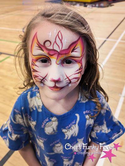 She wanted a cat and a unicorn face paint so she got a kittycorn