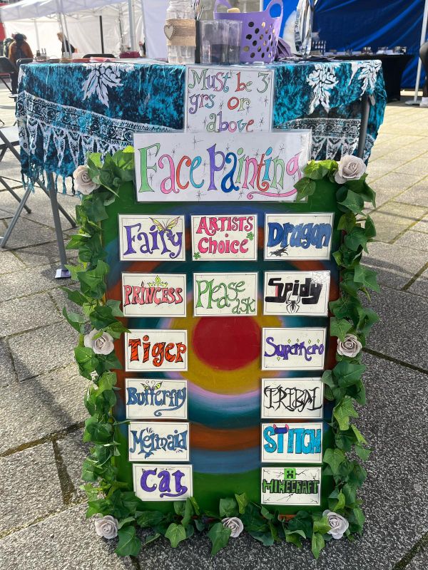 whimsical word board for Chers funky faces face painting Cornwall