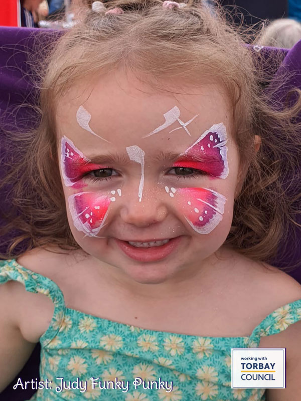 Butterfly-by-judy-funky-punky-at-Torbay-s-Queens-jubilee-celebrations-with-chers-funky-faces