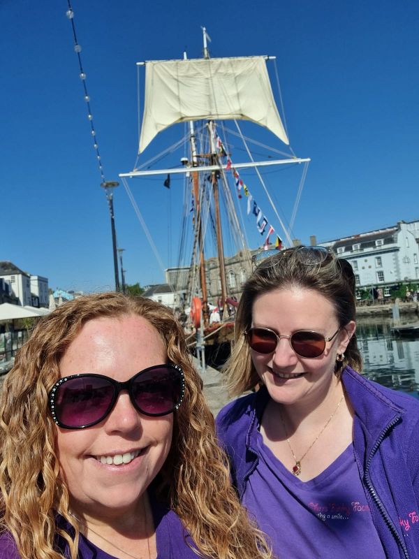 Kaylie and Sophia infront of the pirate ship