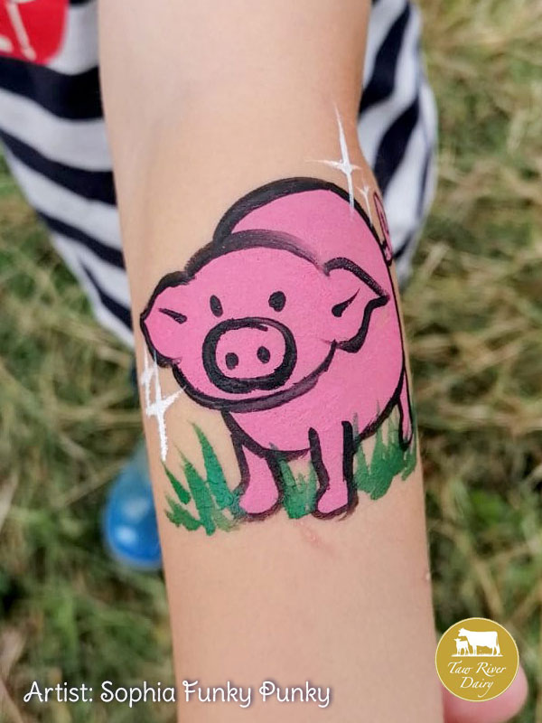 Pig painted on arm by Sophia Funky Punky at Taw River Dairy Open Day Cher's Funky Faces