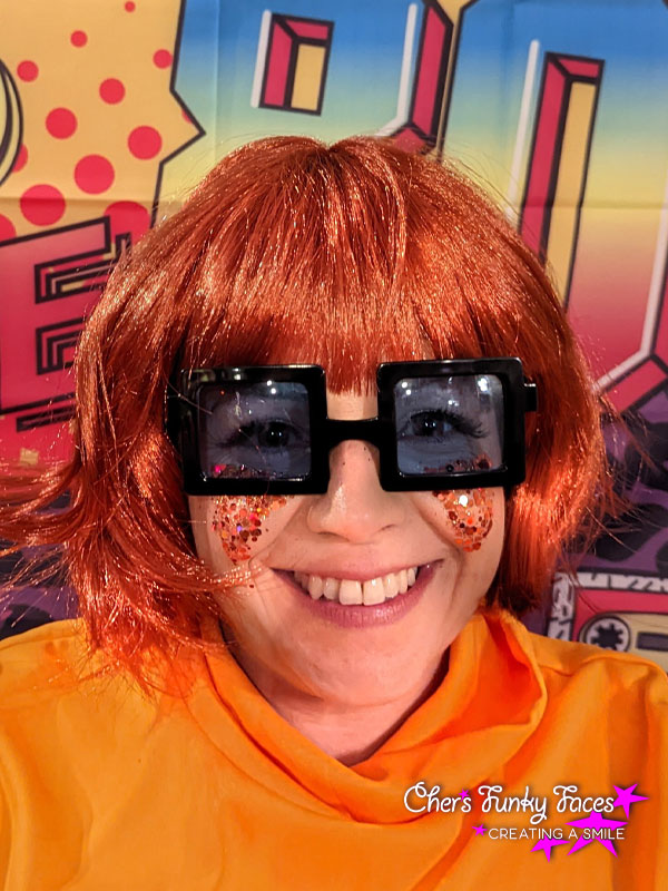 Bronze-glitter-rave-eyes-on-thelma-fancy-dress-girl